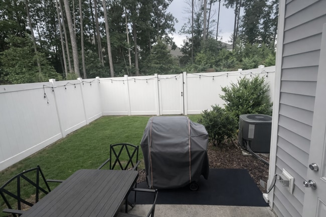 Building Photo - *END UNIT ROLESVILLE TOWNHOME*