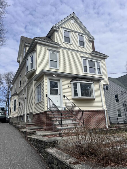 Front of home with shared patio - 61 Wollaston Ave