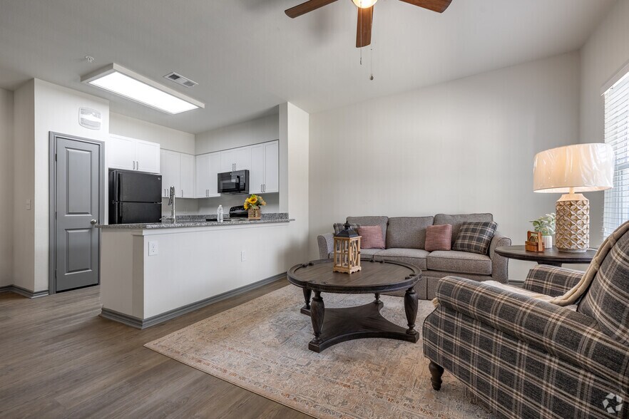 1BR, 1BA - 710SF - Living - Villas del San Xavier