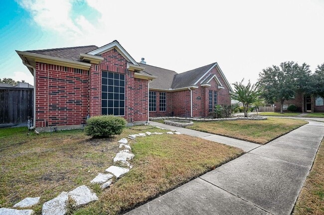 Building Photo - Discover this stunning one-story corner lo...