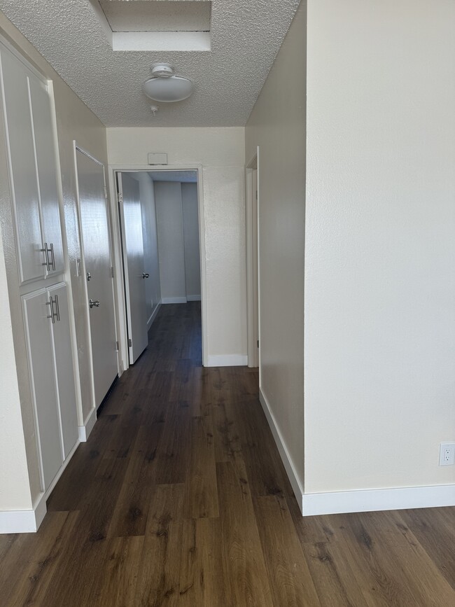 Hallway leading to first bedroom - 12500 Fonthill Ave