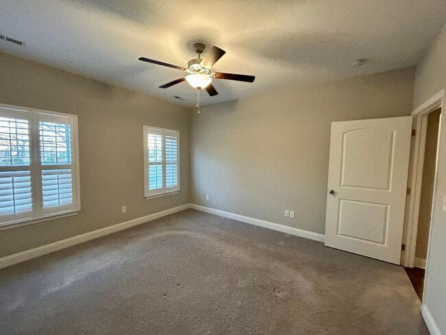 Building Photo - Spacious 3 bed, 3 bath home in Groves Park Commons featuring a modern kitchen, 2-car garage, and ...