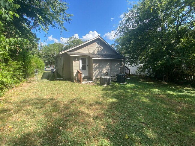 Building Photo - Big kitchen. Fenced yard. Walltown location. Under $1,300.