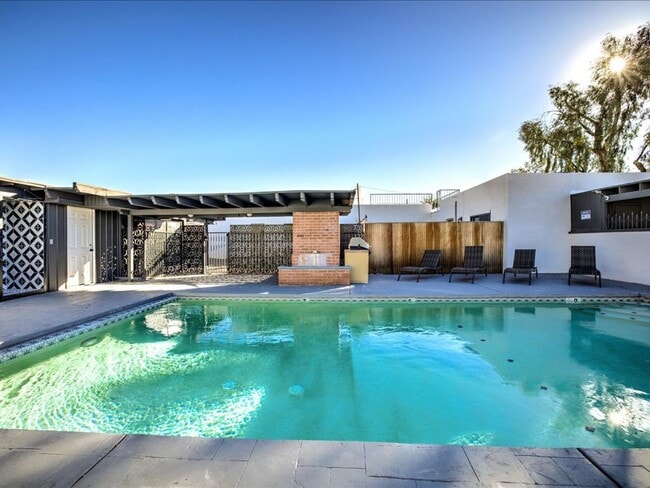 Building Photo - Cozy 2-Bedroom Home with Community Pool & Covered Parking