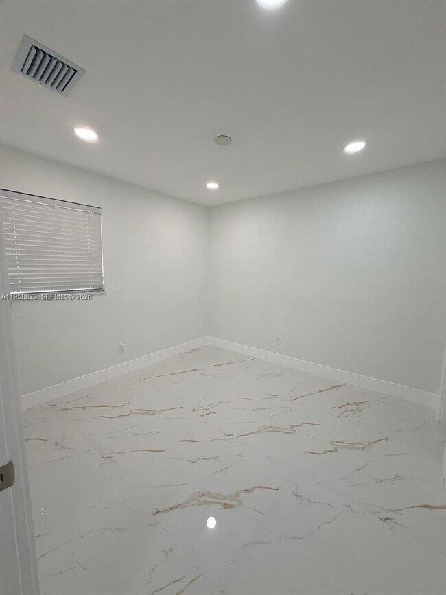 Building Photo - 16820 NW 54th Ct