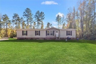 Building Photo - 7096 Monarch Dr