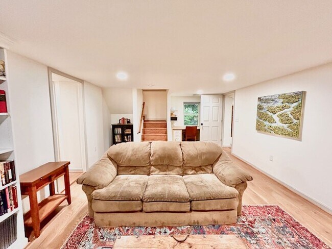 Building Photo - Beautifully renovated 4BR/3BA rambler with wraparound porch and garage