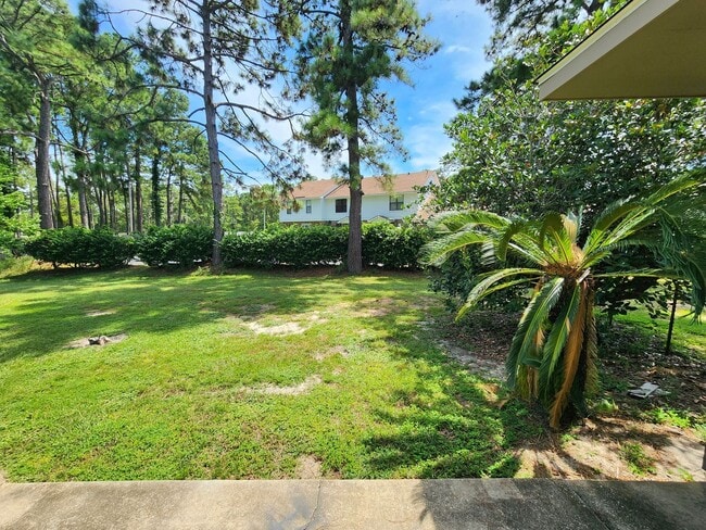 Building Photo - Gulf Shores 2/1.5 condo at Country Club Village