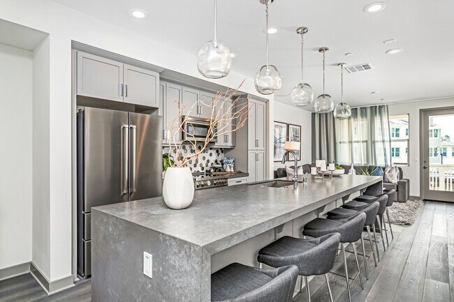 Building Photo - Stunning Fully Furnished Tri-Level Townhome 4BD/4BATHS! Central AC/Heat with Solar! 2 Car attache...