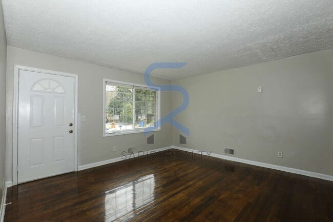 Building Photo - Timeless Ranch Charm in a Vibrant, Peaceful Corner of South River Gardens