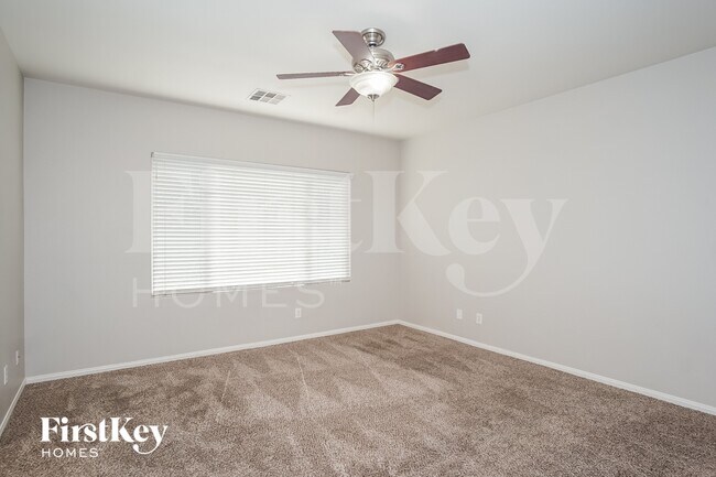 Building Photo - 10387 Howling Coyote Ave