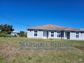Building Photo - Cozy 3 bed 2 bath off Alabama