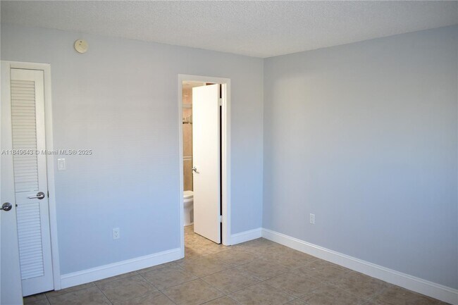 Building Photo - 8590 Sunrise Lakes Blvd