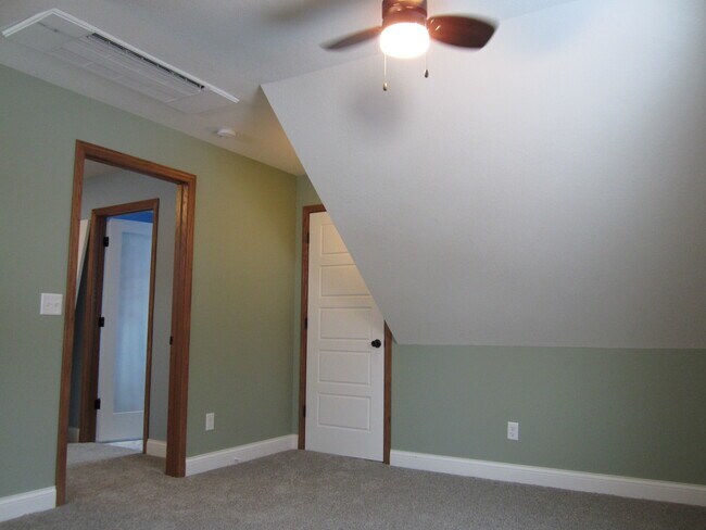 Bedroom #2 heatpump AC and ceiling fan, and first of two closets - 3622 Humboldt Ave N