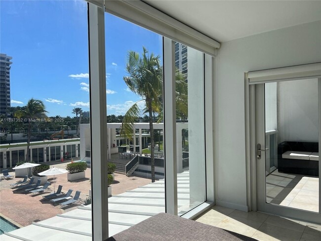 Building Photo - 10275 Collins Ave
