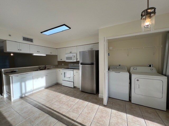 Kitchen-Laundry area - 4935 Sandra Bay Dr