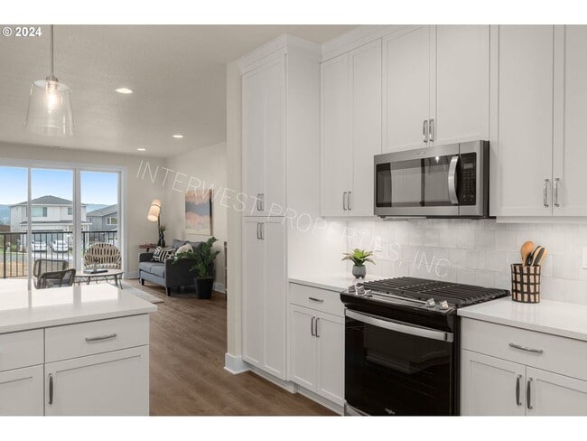 Building Photo - BEAUTIFUL NEWER CONSTRUCTION 4 BD HOME W/2 CAR GARAGE, W/D IN UNIT, AND MORE!