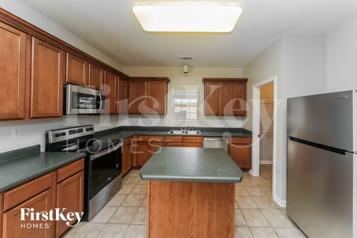 Building Photo - 6358 Red Bird Dr