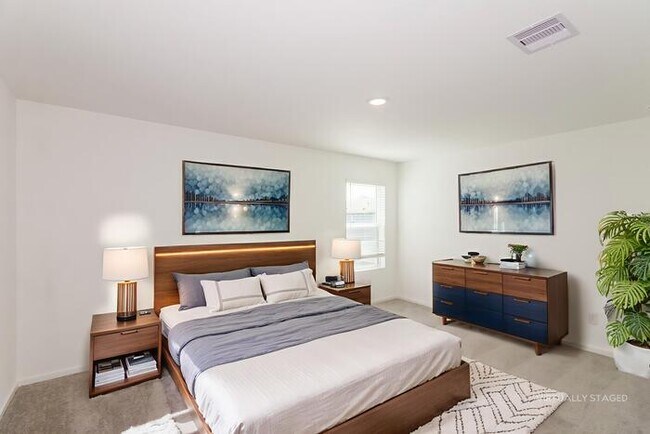 Building Photo - New Home in Sunterra – Enjoy the Beach Lagoon Lifestyle