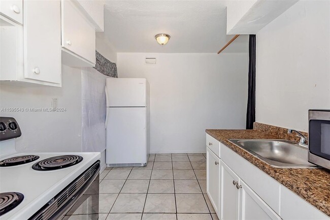 Building Photo - 5600 NW 7th Ct