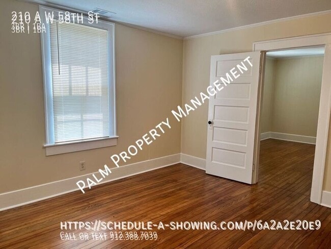 Building Photo - 210 W 58th St