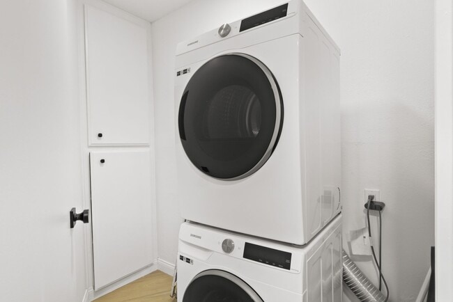 Building Photo - Modern Living Meets Urban Charm in Bankers...