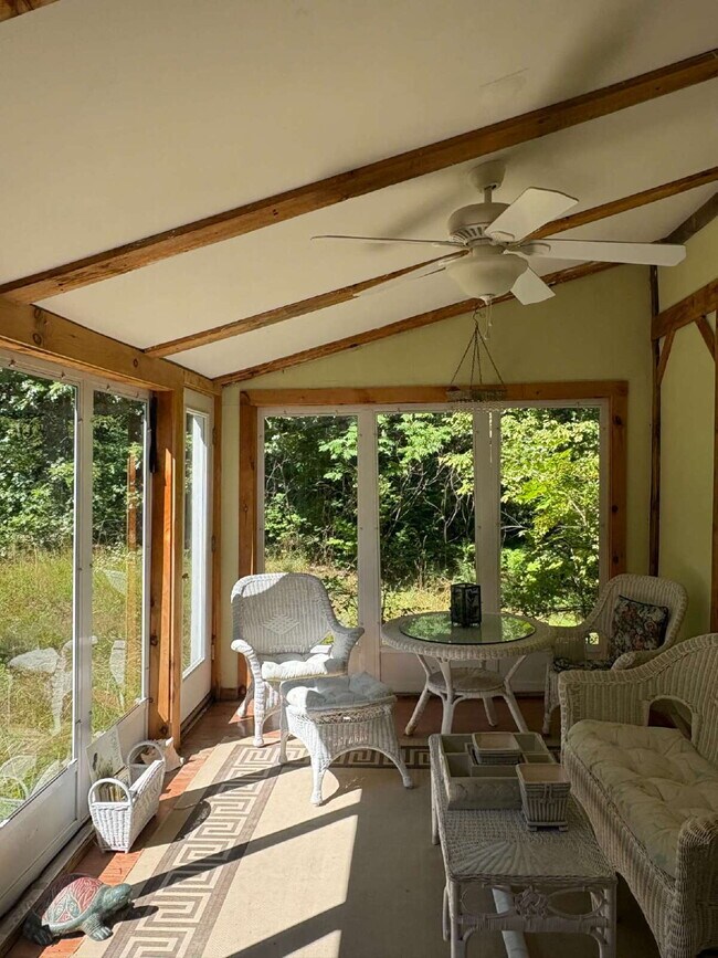 Building Photo - Charming 3BR Waterfront Retreat with Sunroom, Brick Accent & Scenic Lake Views
