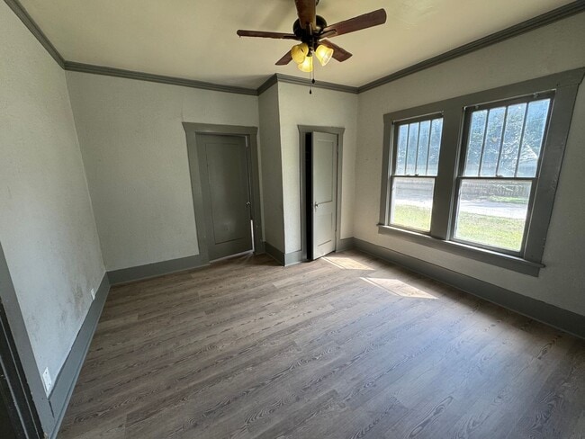 Building Photo - Three bedroom two bath home with central heat and air, large fenced backyard, and carport!