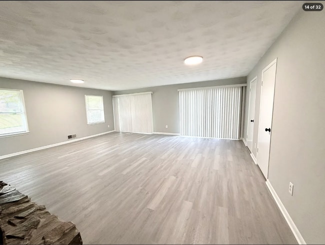 Building Photo - AVAILABLE NOW – FAIRBURN, GA 4 Bedrooms + Flexible Main-Level Living Space | Full Bathroom on Mai...