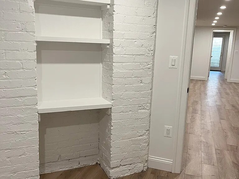 Shelving in the office (flex room). - 1755 Lamont St NW