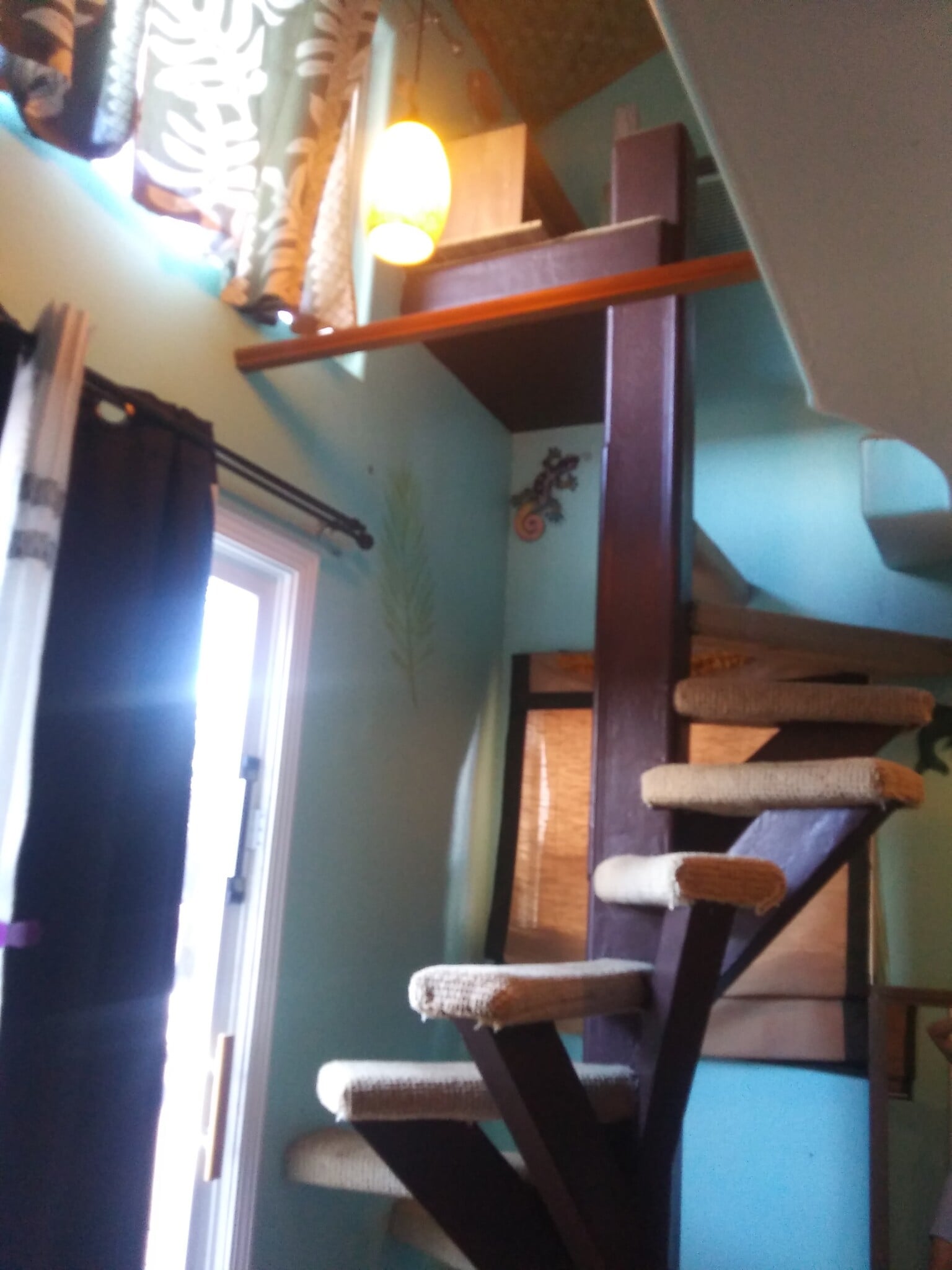 Up the spiral staircase, to Upper Sleeping Loft - 281 Kaikea St