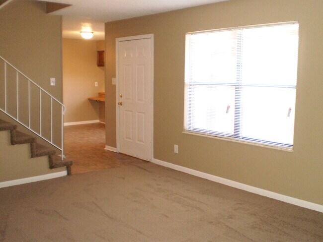 Building Photo - NICE--2 Bedroom 1.5 Bath Townhouse WEST of...