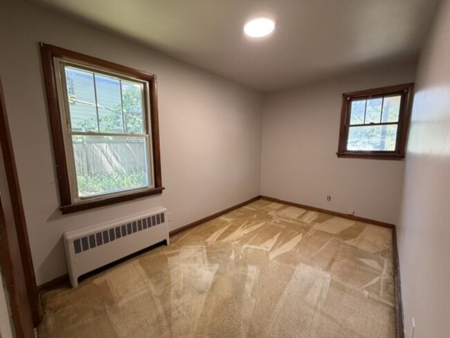 Building Photo - Three Levels of Living with 4 Bedrooms, 2 Full Bathrooms and Multiple Living Areas!