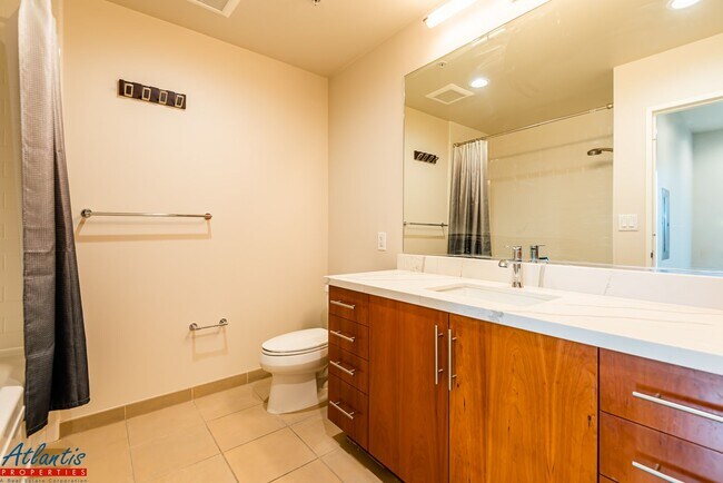 Building Photo - Axis Condominiums | Downtown Living | Full Service Building