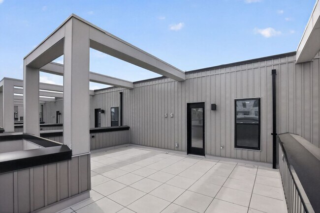 Building Photo - Garage parking, private outdoor space, and skyline views—this Northern Liberties home checks ever...