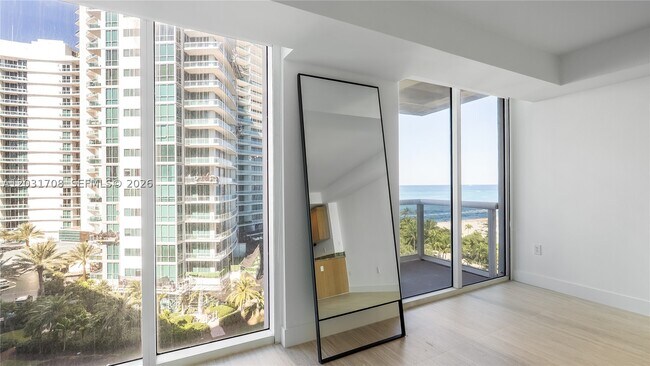 Building Photo - 10275 Collins Ave