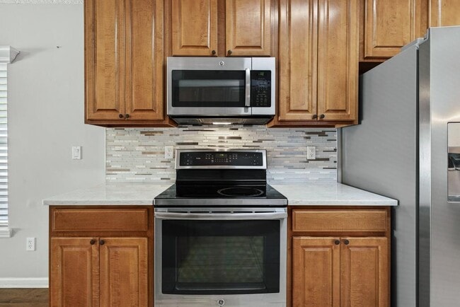 Building Photo - 1727 Canopy Oaks Dr