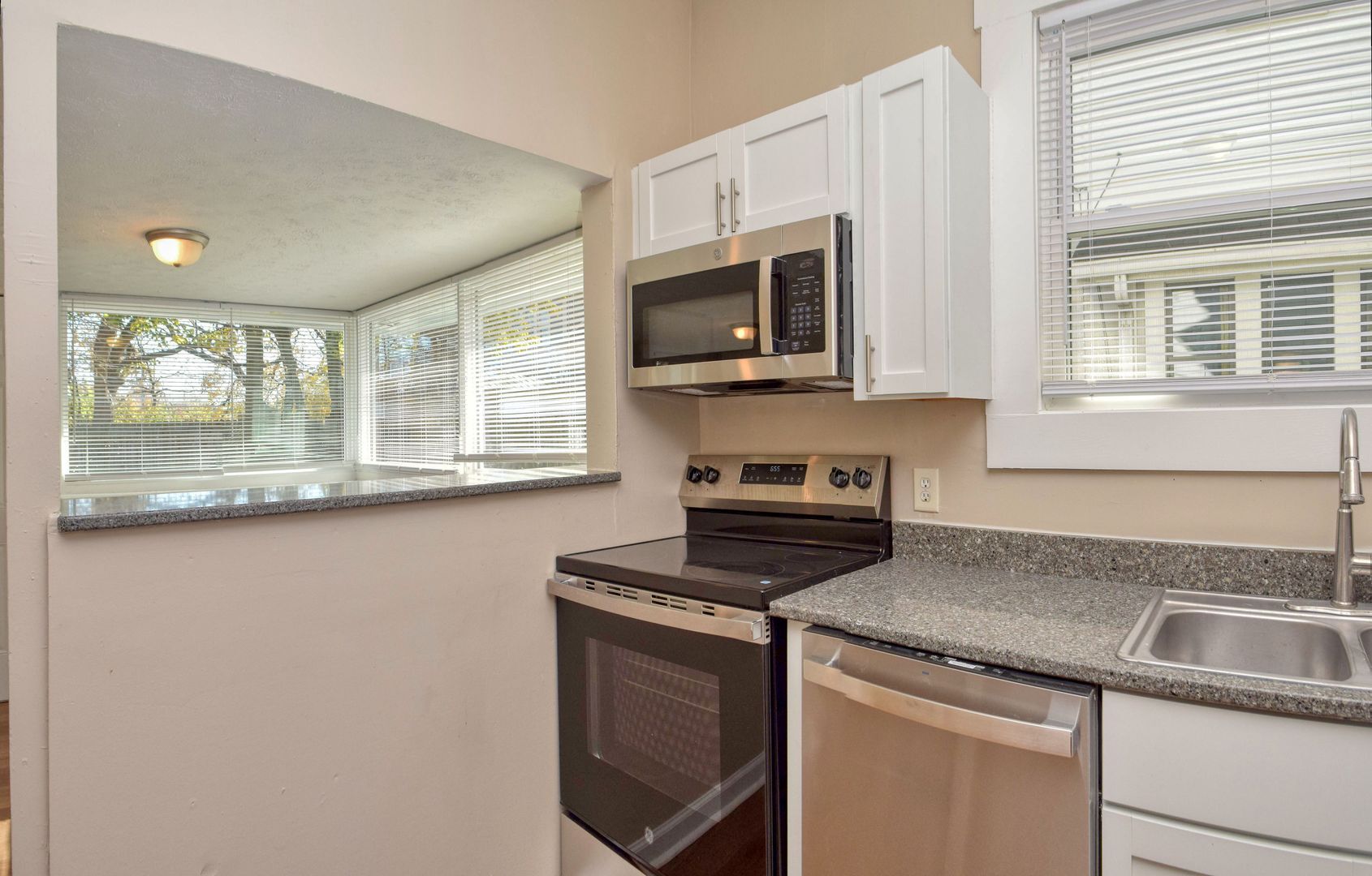 Building Photo - Bates-Hendricks/Newly Remodeled 3 Bedroom Half Double