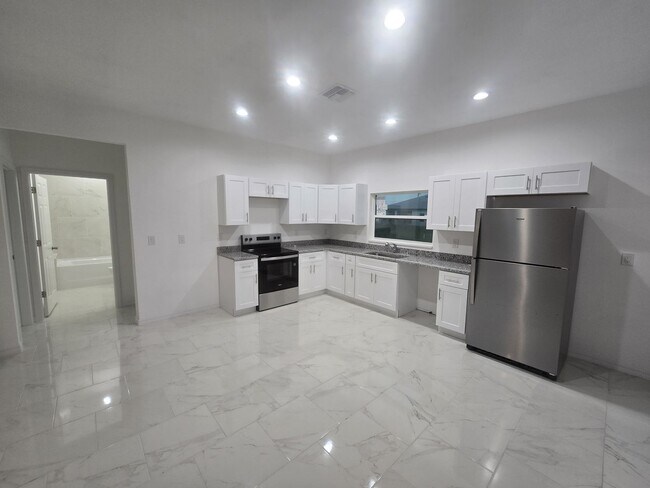 Building Photo - BRAND NEW THREE BEDROOM, 2 BATH, 1 CAR GAR...