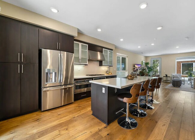 Building Photo - Tucked within the Hollywood Hills in a gated community