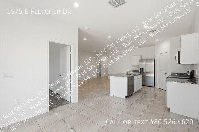 Building Photo - 1575 E Fletcher Dr