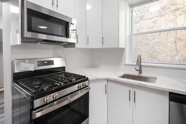 Building Photo - Renovated 4-Bedroom Home with Modern Finishes