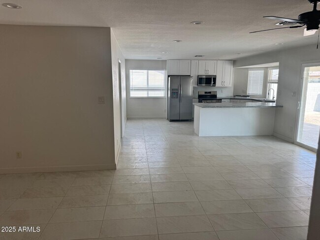 Building Photo - 8837 W Highland Ave