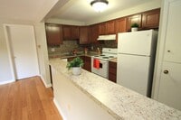 Logan Station C Kitchen - Apartments at Logan Station