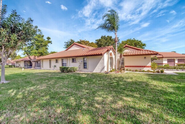 Building Photo - 10927 Dolphin Palm Ct
