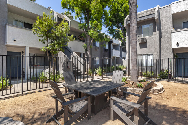 Unwind by the cozy fire pit in the pool area at Scripps Poway. - Scripps Poway Villas