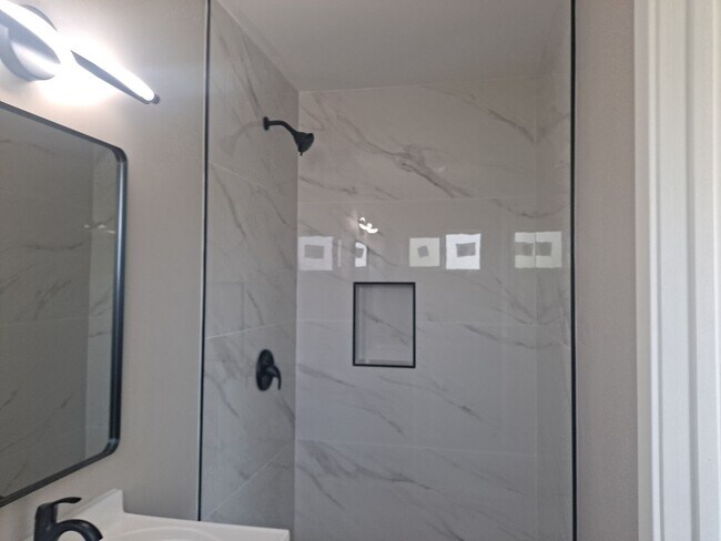 Building Photo - upstairs studio lots of natural lite