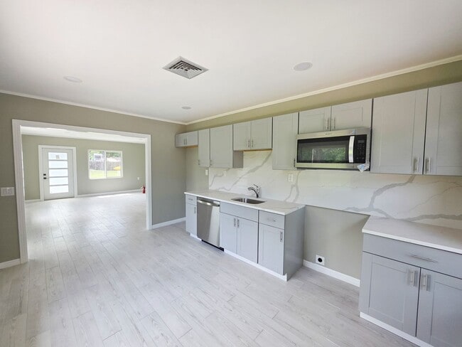 Building Photo - 100% Remodeled 2 bedroom 1.5 bath ANNUAL RENTAL