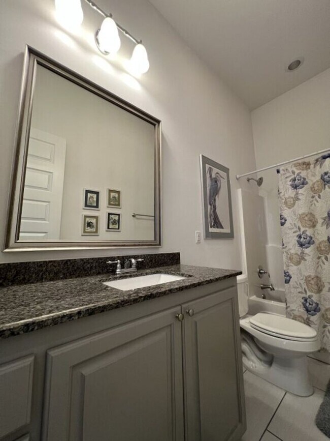 Building Photo - Luxury 4BR Home in Americana | 11 Ft Ceilings, Courtyard Living & Furnished Option