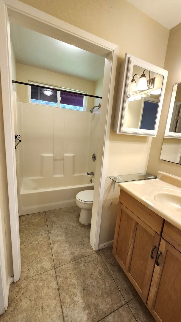 Building Photo - Ah Puck, Jordanah &amp; Tyson